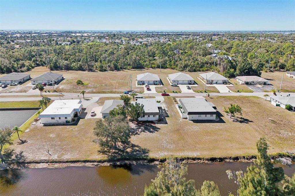 Photo of 124 Boundary Boulevard, Rotonda West, FL 33947 (MLS # TB8469007)