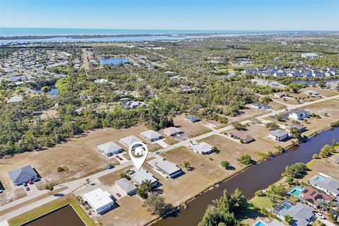 Photo of 124 Boundary Boulevard, Rotonda West, FL 33947 (MLS # TB8469007)