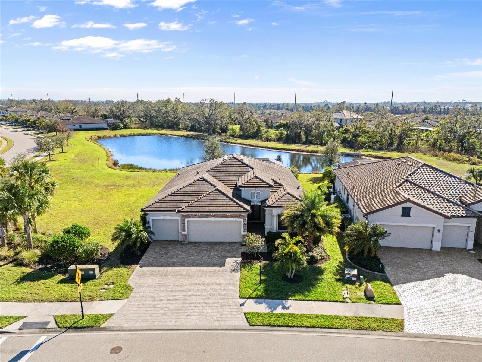 Discover the perfect blend of comfort and convenience in Lakewood Ranch—recognized as the nation’s #1 best-selling master-planned, multi-generational community for 8 consecutive years! Located on the eastern side of Lakewood Ranch is Polo Run, a gated, solar-powered, maintenance-free community designed for easy living. This beautifully crafted Lennar single-story home showcases a versatile split floor plan with 4 bedrooms and 2 bathrooms, highlighted by a spacious primary suite. Once inside, you’re welcomed into an open, light-filled living area where the kitchen’s granite counters and alabaster cabinetry flow seamlessly into the dining and gathering spaces. Outside, enjoy the ultimate Florida lifestyle with a sparkling saltwater pool and spa overlooking a peaceful pond—your own private retreat.
What truly sets this home apart is its location within the community where you can enjoy the best of both worlds: close proximity to the amenity center paired with maximized privacy, thanks to the adjoining green space and absence of neighbors on three sides—leaving you with picturesque water views both front and back. Other highlighted features of the home include an Air-conditioned 3-car garage, Solar Panel System owned outright, New LVP flooring in primary suite & den (2024), and a New pool heater & pump (2023). Solar Panel System is owned outright!