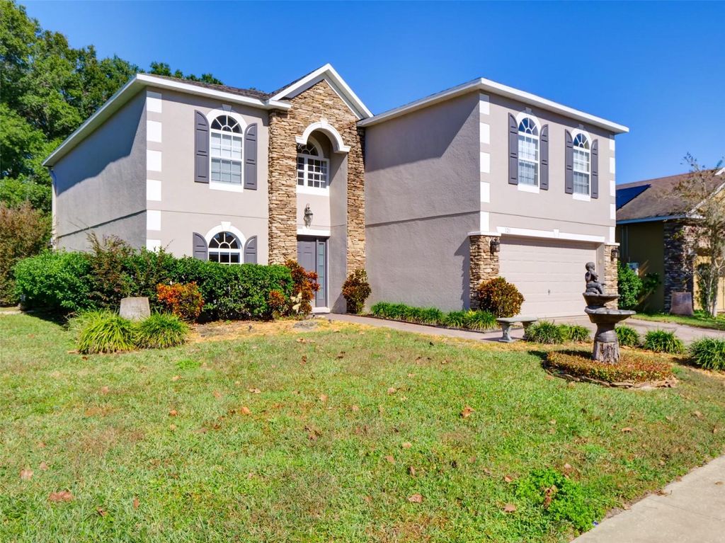 Photo of 121 W Fiesta Key Loop, Deland, FL 32720 (MLS # O6360188)