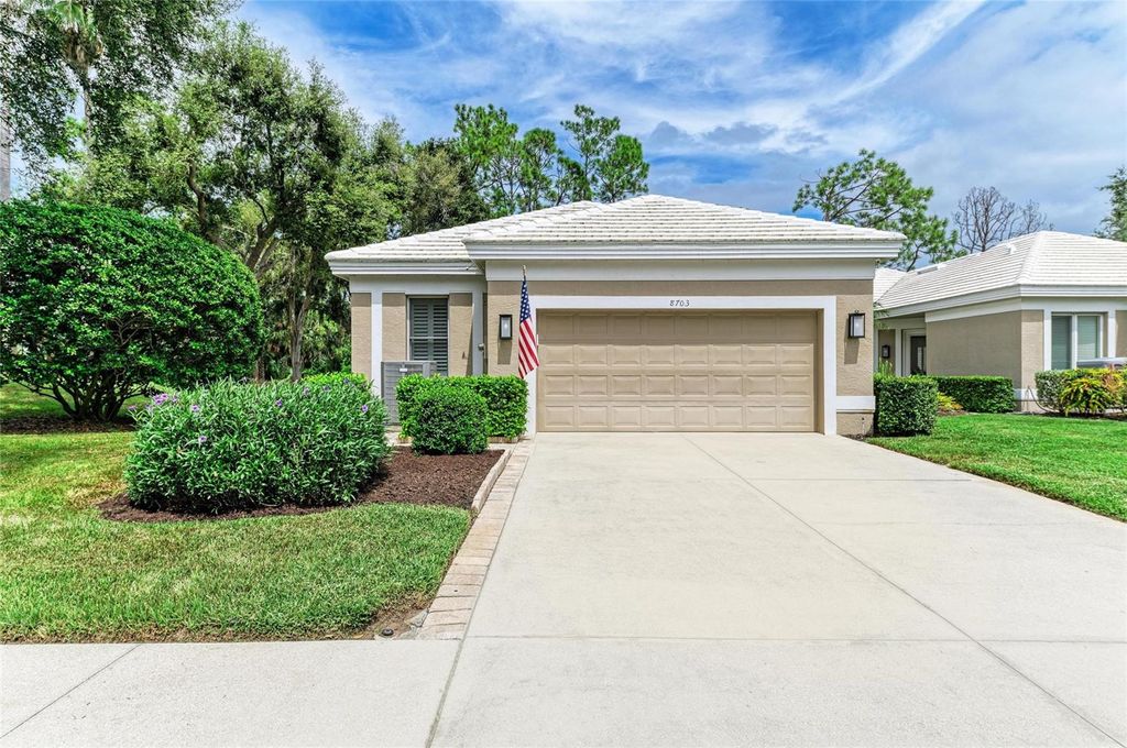 Photo of 8703 53rd Terrace E, Bradenton, FL 34211 (MLS # A4664979)