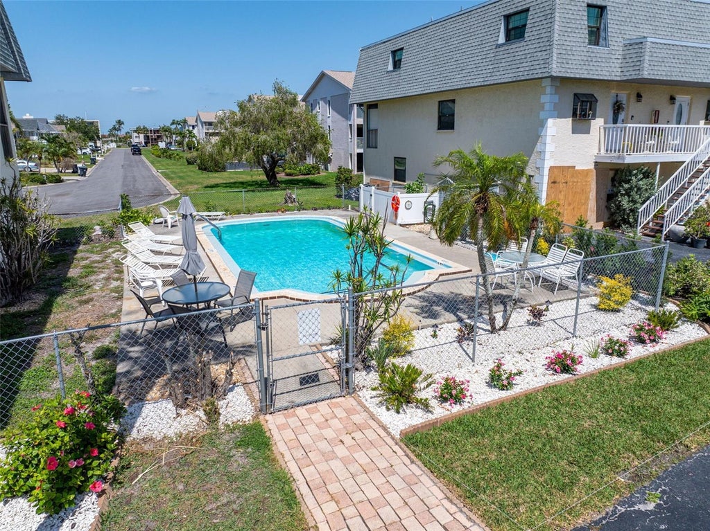 Photo of 12485 2nd Street E #C103, Treasure Island, FL 33706 (MLS # TB8518295)