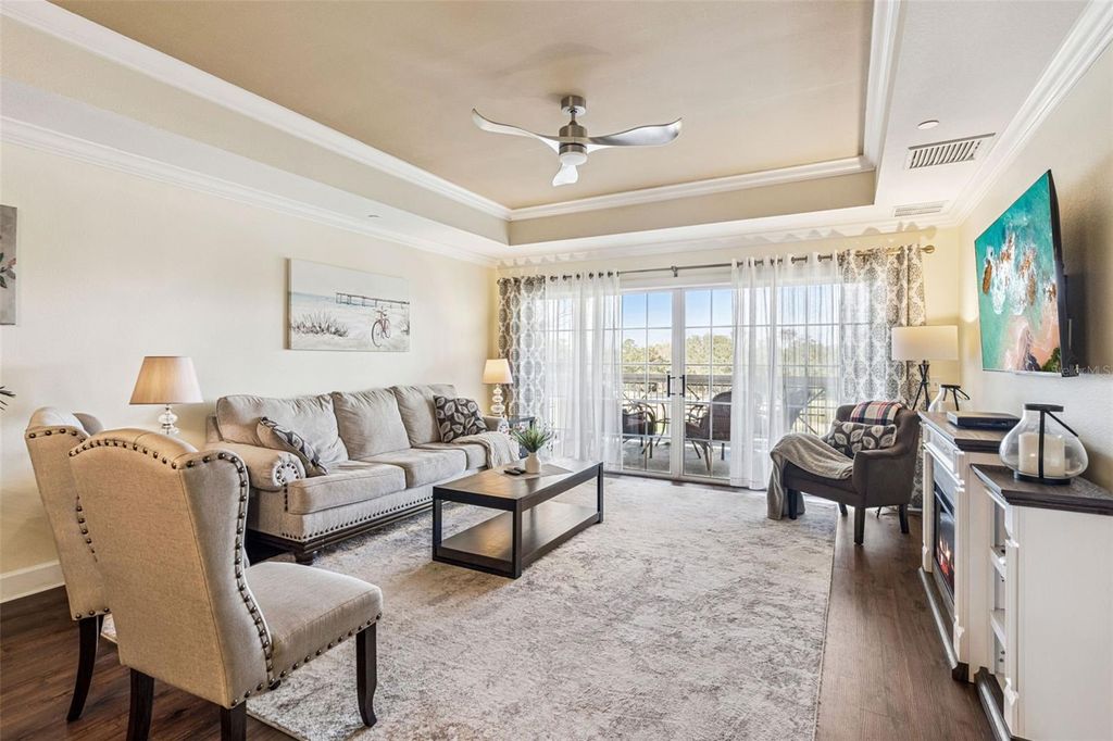 Photo of 1356 Centre Court Drive #202, Reunion, FL 34747 (MLS # O6372754)