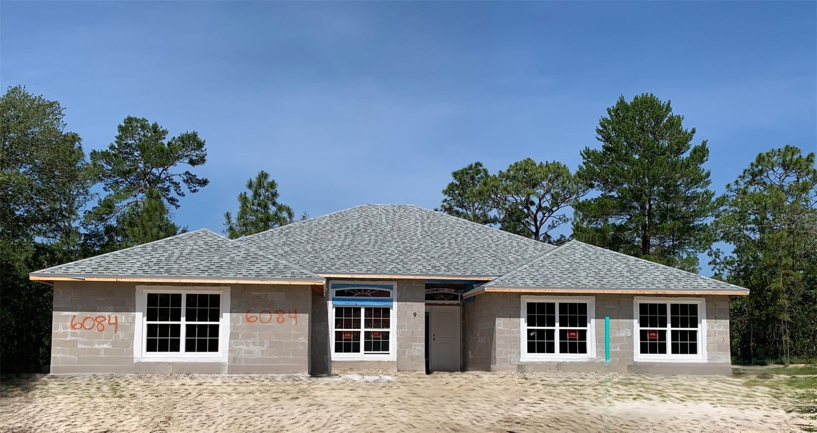 Under Construction. SELLER PROMO ON THIS BRAND NEW 3000 SQ FT HOME IN PINE RIDGE!! THIS FANTASTIC 4BED/3 BATH/3CAR SIDE ENTRY GARAGE IS ON AN OVERSIZED CORNER LOT ON GREAT STREET AND HAS ALL THE RIGHT FINISHES!! WOOD LOOK TILE EVERYWHERE EXCEPT BEDROOMS, GRANITE COUNTERTOPS THROUGHOUT, 2 ISLANDS IN HUGE KITCHEN WITH WOOD SHAKER CABINETS AND STAINLESS-STEEL APPLIANCE PKG. COVERED PATIO MEASURES 21'X10', OWNERS BEDROOM IS HUGE AND HAS A TRAY CEILING W/CROWN MOLDING, TWO WALK IN CLOSETS, GARDEN TUB W/SEPARATE TILE SHOWER AND PRIVATE WATER CLOSET. EXTERIOR OF HOUSE WILL HAVE STONE ACCENTS, GARAGE DOOR "LIGHTS" ON TOP ROW OF DOORS FOR NATURAL LIGHT IN GARAGE. THIS HOME IS UNDER CONSTRUCTION AND IS CURRENTLY AT 70% COMPLETION.
SELLER PAYS CLOSING COSTS W/CASH TRANSACTIONS AND WITH APPROVED LENDERS FOR MORTGAGES. THERE IS ALSO SELLER OFFERED FLEX MONEY ON THIS PROPERTY THAT CAN BE USED TO BUY DOWN INTEREST RATES.