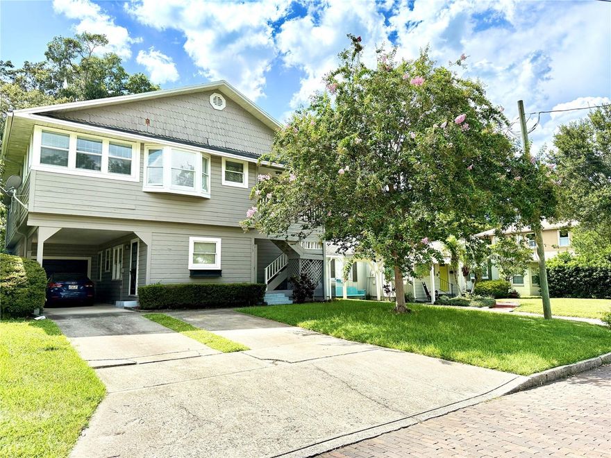 BRAND NEW ROOF JUST INSTALLED AUGUST 2025!!!  A Fantastic Income-Producing Opportunity in One of Orlando’s Most Vibrant and Central Neighborhoods. This Spacious Two-Story Property Features 5 Bedrooms and 3 Bathrooms (2 Bed/1 Bath Downstairs and 3 Bed/2 Bath Upstairs) a One Car Garage and a Carport. Perfect for Investors or Multi-Generational Living. The Home is Currently Split into Two Units: The Downstairs Unit is Tenant-Occupied with Long-Term Stability, while the Upstairs Unit is Currently Vacant and Ready for Occupancy or Additional Rental Income. The Downstairs Tenant has been in Place for 8 Years, Paying $1,500/month with a Current Lease Running Through 12/31/2025. The Upstairs Unit is Larger and can be Rented for $3,000 per month. Tenant is Responsible For Utilities (Electric and Water) and Internet/Cable. The Upstairs Unit Offers Great Potential for Owner-Use or to Generate Additional Income in this High-Demand Area. The Property Boasts Excellent Curb Appeal, a Beautifully Landscaped Front Yard and a Bright, Open-Concept Interior. Inside You’ll Find a Spacious Living Room, Modern Kitchen with Stainless Steel Appliances and Large Bedrooms Including a Primary Suite with Private Bathroom. The Backyard Offers a Peaceful Patio—Ideal for Relaxing or Entertaining. Located Minutes from Downtown Orlando, Shops, Restaurants, Parks and Major Highways, This Property Combines Urban Convenience with Long-Term Investment Potential. Don’t Miss This Income Property in a Prime Orlando Location!