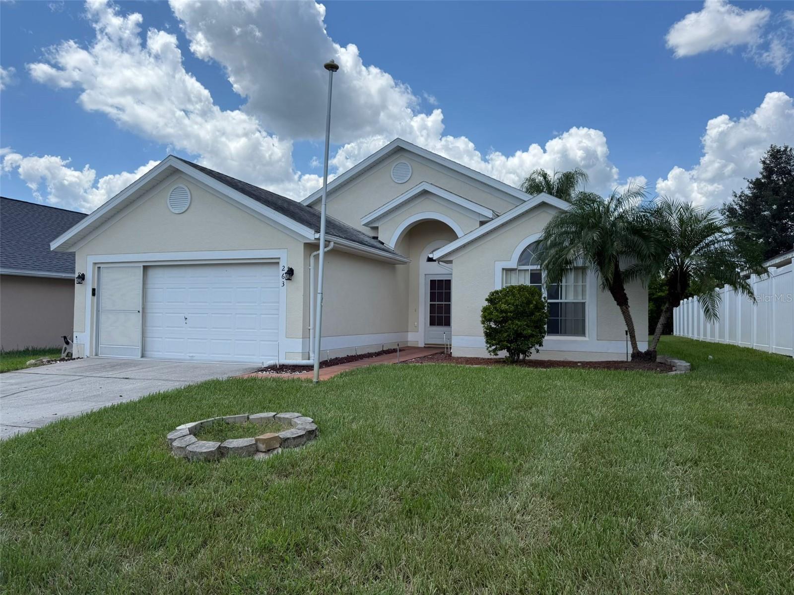 This charming home has been completely renovated, 3 bedrooms and 2 bathrooms, so you can enjoy an open and modern concept overlooking the beautiful pool, with a cozy and new kitchen, new appliances, porcelain floors, modern and comfortable bathrooms. Outside, your private oasis awaits with a solar-heated salt chlorine pool and a shaded lanai, ideal for relaxing or hosting BBQs amidst the lush bamboo for ultimate privacy. Conveniently located near Disney, Interstate 4, US192, and Hwy 27, you'll have easy access to all the attractions and amenities Central Florida offers. After a day of adventure, park your car in the garage, adding both functionality and convenience to your lifestyle. Don't let this opportunity slip away—schedule a showing today and begin living the Florida dream in your own slice of paradise!