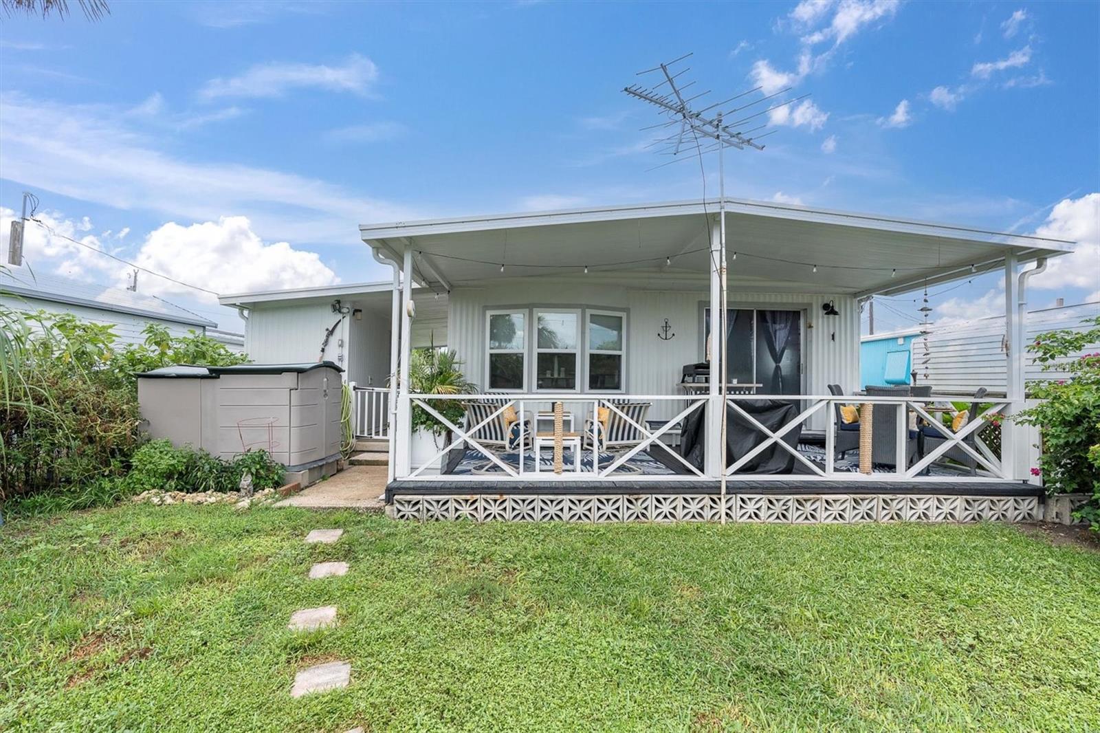 A MUST SEE! A Gorgeous, completely remodeled, Waterfront Home with a lot of upgrades & special touches throughout this home. Direct access to the Gulf within minutes & No bridges. It has 42 ft on water, with a concrete seawall. This home features a beautiful kitchen with a island kitchen & seating, beautiful porcelain countertops, a large, farm style sink & nautical lighting. All Hisense stainless steel appliances, a french door style fridge with interior water & ice maker, a 5 burner gas stove w/air fryer & griddle, a professional, motion sensitive, range hood & a 3 rack dishwasher. Includes a small breakfast nook overlooking the canal. & includes a adorable Coffee bar cabinet which conveys, if desired. The kitchen has plenty of cabinets & storage space with a built in cabinets that also include Live edge shelving w/decorative piping. Near the Range area, it also has 2 pull out spice racks, apull out garbage bins & a deep pantry. This is a Open floor plan of Living room/Kitchen/Nook with lots of natural light & the living space over looks the canal. The sliding glass doors in the livingroom open onto the large (23x10) wood porch overlooking the canal. The living room features a beautiful electric fireplace that includes heat for those chilly nights. The Fireplace mantle & shelving is also live edge. This home has 2 bedrooms & both have walk-in closets that include built in closets w/ barn style doors. The Master bathroom has a tile walk in shower, the hall 2nd bathroom has a tub/shower combo, built-in cabinet & a Linen closet.This home features New 2025 Solid core LVP flooring w/cork backing, gorgeous nautical white shiplap half walls, 2022 Nautical lighting & fans everywhere & all with remotes.  Electric, tankless 2023 hot water heater,  Energy efficient 2025 Mini Split AC, new windows & roof is metal. Wood, floating dock (12x8). Large (23x11) covered carport w/an addit'l 45 feet of driveway for plenty of parking. The laundry room is exterior & located in the workshed across from the front door. This is a perfect, walk-in ready, canal home to make your own & start living the florida lifestyle!
Hudson is centrally located to many options for restaurants, shopping, minutes from Hudson Beach, hospitals & doctors. It is only 10 minutes to SunWest Park with its large man made sandy beach & water park that everyone will enjoy. Hernando, Homosassa, Crystal River to the north & many.. locations south such as New Port Richey, Dunedin, Clearwater beach, there is never a shortage of things to do. Tampa & Tampa International Airport are within an hour and Orlando and all the amusement parks can be reached within a 2 hour drive.
This home is move-in ready & ideal for anyone looking to enjoy Florida Waterfront Living or also great for an airbnb/VRBO! You own Home & Land. No HOA's, direct access to open water.
Come and check it out! Home is being sold cash only w/valid POF. Furniture is not included but negotiable separately. Buyer and buyers agent to verify all measurements