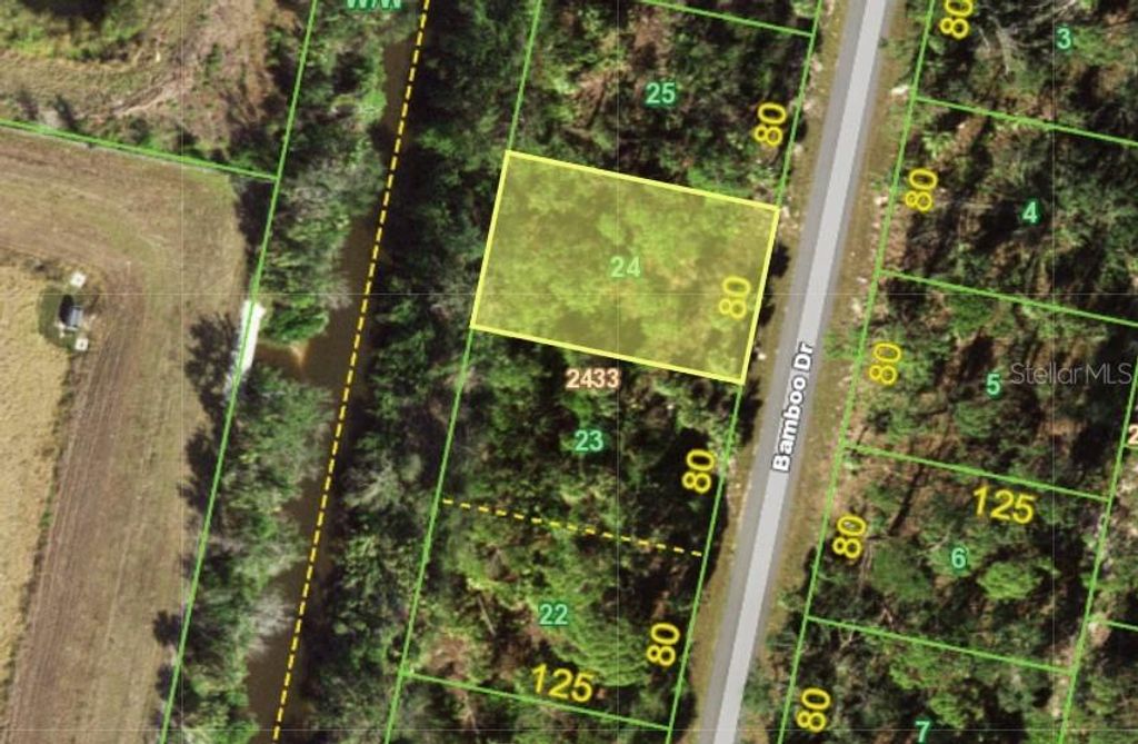 Photo of 111 Bamboo Drive, Port Charlotte, FL 33954 (MLS # D6140851)