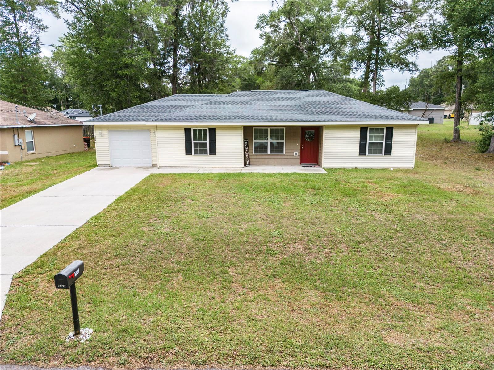 ARE YOU LOOKING FOR THE PERFECT STARTER HOME OR WINTER RETREAT, THIS IS IT!!! Move in ready home, built in 2021, 3 bedroom 2 bath, split plan with tile floors in the main living areas and carpet in all 3 bedrooms. Inside, you'll find a spacious living area with high ceilings and large windows that let in plenty of natural light. The open-concept kitchen features granite countertops, modern appliances and ample cabinet space. The bedrooms are generously sized and offer plenty of closet space, while the bathrooms are well-appointed with stylish fixtures and finishes. Located just minutes from shops, restaurants, and entertainment, this home is perfect for those who want to enjoy the best of city living while still having a private oasis to come home to. Don't miss out on the opportunity to make this stunning property your own!