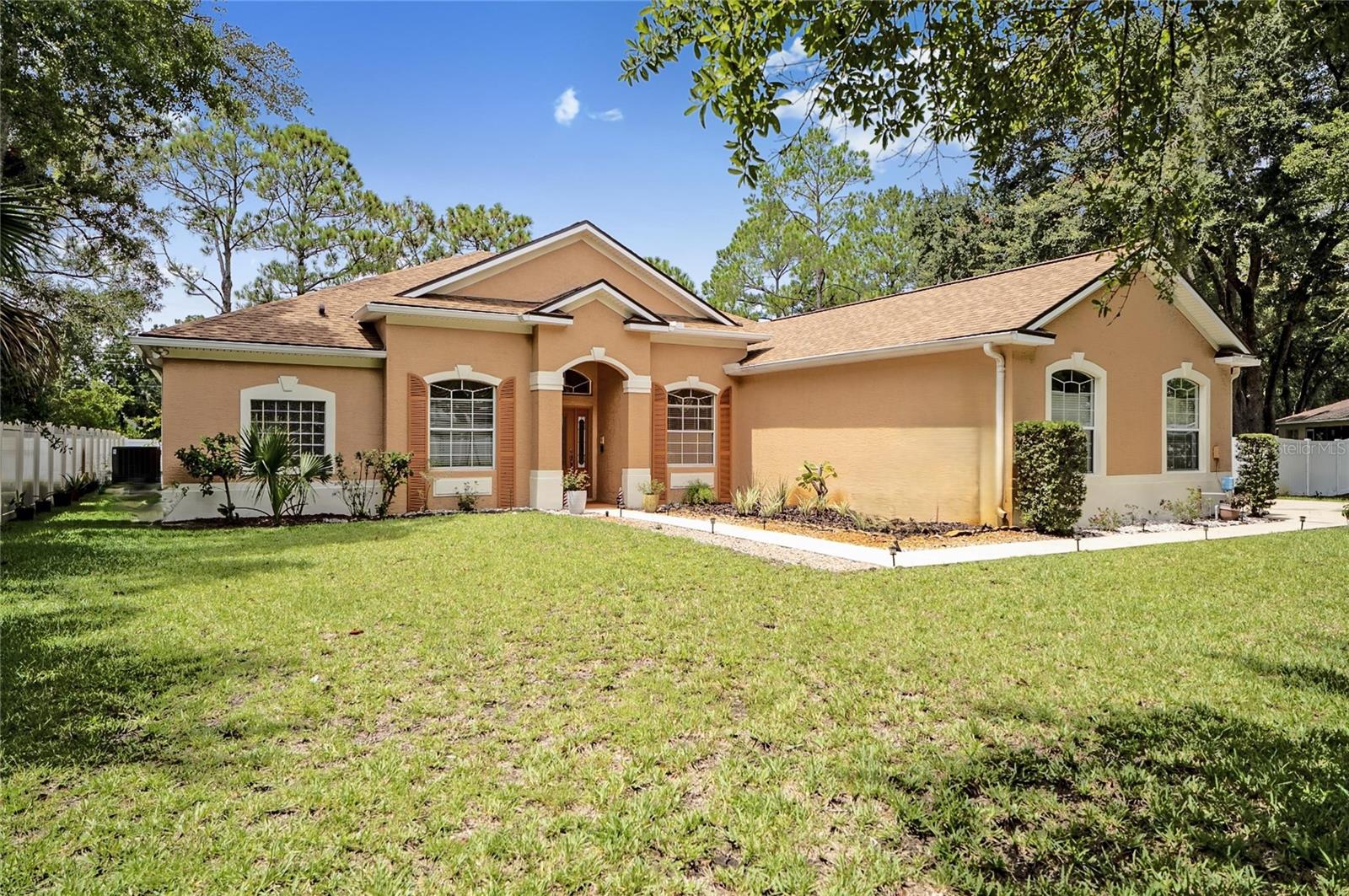 Welcome to this STUNNING 4/3/3 Palm Coast residence designed with a spacious split floor plan and soaring high ceilings. This home offers a formal living and dining rooms, a huge Florida room, and a sunny breakfast nook. The chef’s kitchen is the centerpiece, featuring a large island, Corian countertops, stainless steel appliances, a French door refrigerator, a walk-in pantry, and a convenient counter bar for casual dining.
The Master Bedroom suite is privately tucked away and boasts a jets spa-like bath, separate shower, dual sinks, private toilet room, while two of the three bathrooms feature his-and-hers vanities for added comfort. Generous bedrooms, abundant natural light, and thoughtful design details make this home ideal for both everyday living and entertaining.
Outdoor living is just as inviting with a screened lanai under roof, additional exterior door for ease access to guest bathroom, fenced backyard, plenty of room for a pool in the future. Irrigation system supplied by a private well. Additional highlights include a 3-car garage and a roof only 1 year old, NO HOA, NO CDDs.
Perfectly located near Palm Coast Aquatics Center Frieda Zamba Swimming Pool a popular amenity in the area, shopping, schools, churches, parks, nature trails, Town Center, and just minutes to Flagler Beach, this home combines functionality, style, and convenience in one beautiful package. Owner is selling all furniture and Rolls Royce 1977 Silver Shadow:)