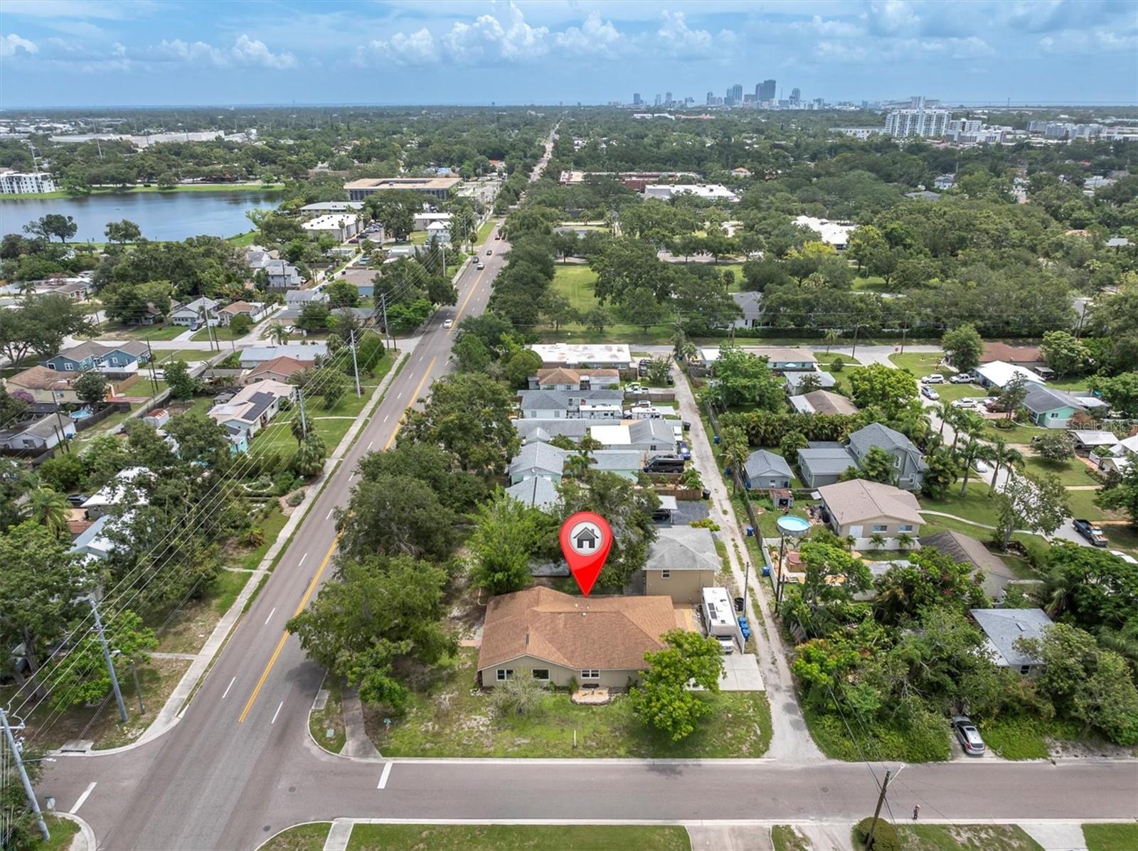 Multi-Family, Multi-Generational Income Property | Double Lot | Prime St. Pete Location Rare opportunity to own a versatile multi-family property on a double lot, just minutes from Downtown St. Petersburg and the Gulf beaches. Perfect for multi-generational living, rental income, or Business owners. No Flood Insurance required here! You will be High and Dry! Welcome to this amazing property, as you enter the main home you will love the spacious living room with bamboo flooring, with 2 bedrooms in the front of the home and an updated guest bath, you will love the layout, the updated kitchen and breakfast nook are located in the center of the home, the family room has updated impact windows and engineered hardwood floors, the Primary bedroom is in the back of the home with updated beautiful en-suite bath. The roof, a/c, water heater are all from 2017. This home has many custom features including Media closet, custom cabinets, medicine cabinets and soft close drawers. You will fall in love with the rear covered lanai on the back of the home. The huge yard has been beautifully landscaped with bamboo trees. RV charging hook up on 2 story building. The 2nd lot has a 2500 sq ft completely air conditioned structure, The 1st floor has a flex space and work shop, upstairs you will find a complete one bedroom one bath ADA compliant unit with a newer ac (2017) and original hardwood floors, there is a chair lift inside for safety or your guest/family could use the exterior stairs for complete private entry. Or maybe convert this to a 3 bedroom 2 bath rental or multi generation home.
There are so many possibilities, you will definetly will want to schedule your private showing and imagine the possibilities for yourself!
Separate meters in place for each building