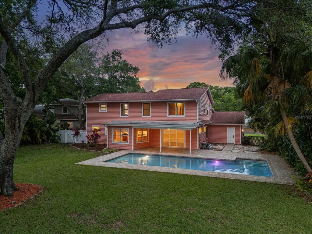 Photo of 1550 Chateau Wood Drive, Clearwater, FL 33764 (MLS # TB8495817)