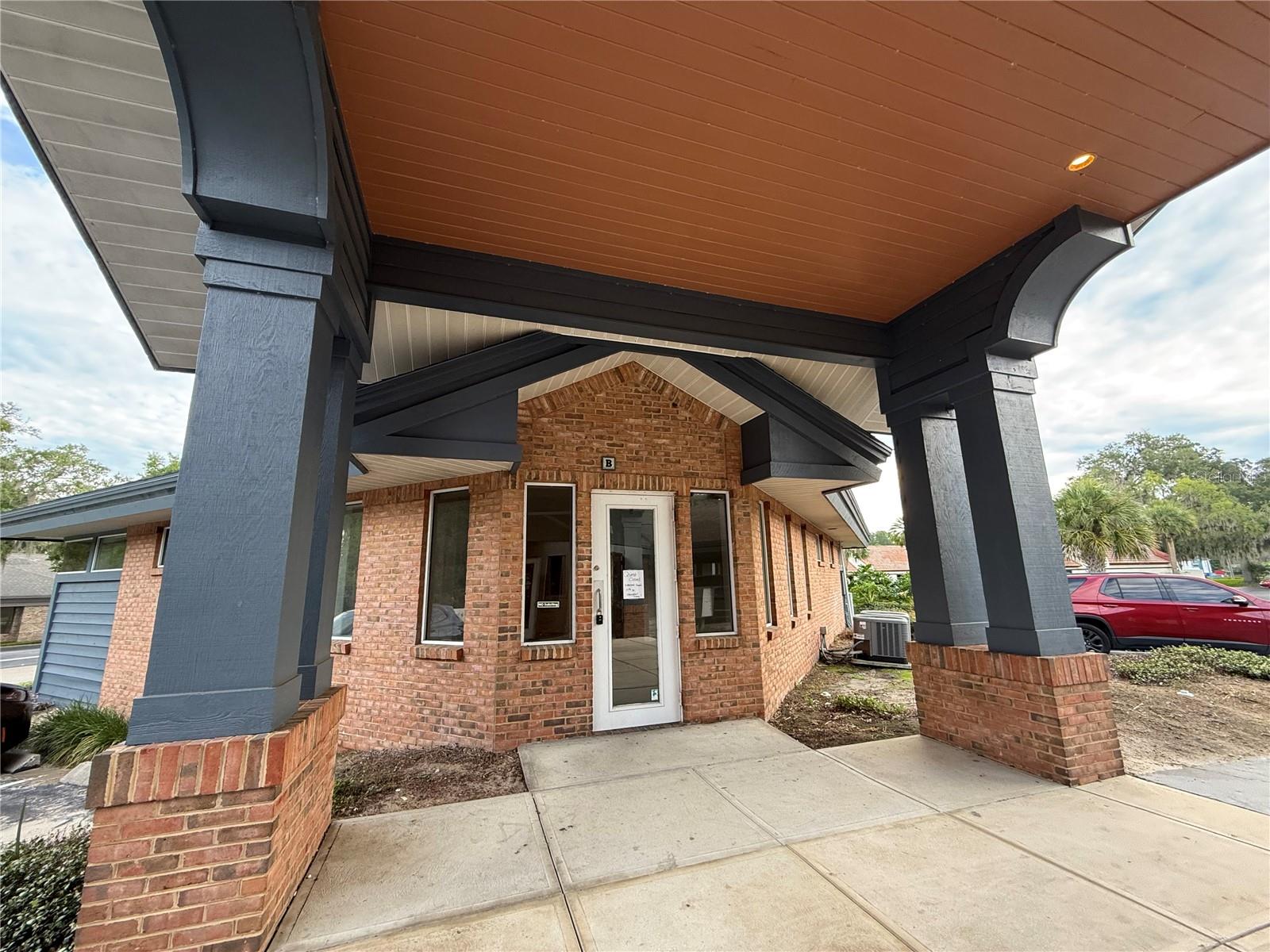 Offered for lease is a spacious medical/professional office, just under 2,000 sq ft, offering a versatile layout to suit a variety of business needs. The suite features an ample lobby/reception area, two ADA-compliant restrooms, kitchen/break area, storage/flex room, and four cubicle-style sections that can be enclosed to create private offices. With durable laminate flooring throughout and a functional floor plan, this space is well-suited for medical practices, labs, or professional offices seeking a convenient, move-in-ready location. Strategically located near downtown Ocala, SR 200, and US Hwy 441, this professional office offers easy access to hospitals, schools, restaurants, and surrounding neighborhoods. The suite features ample on-site parking and is situated among other well-maintained offices within a professional park. Great signage as well.