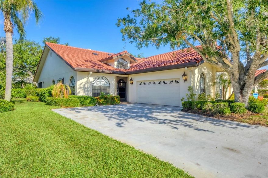 One or more photo(s) has been virtually staged. Virtually Staged. Villa D Este is a boutique enclave of maintenance free homes located on Palmer Ranch.  It is situated close to the country club in Prestancia The gated community offers more than just a home…it provides a lifestyle. Explore the Audubon-sanctioned wildlife sanctuary, winding walking paths with views of the wildlife, trees, lakes and the golf course. If you're a golf enthusiast, take advantage of the two 18-hole golf courses available with optional membership. Prefer the beach? The world-renowned Siesta Key Beach is just miles away.  An avid biker Legacy trail is close by. Experience Florida living at its finest in this exceptional Sarasota residence. A two bedroom 2 bath villa with an updated kitchen. A morning room flooded with natural light. The home offers a coveted great room design with soaring ceilings, a wood burning fireplace, a wet bar for entertaining and more.  The oversized owner's suite has a walk-in closet, a sitting area, and an oversized bathroom.  The guest suite is separate from the primary.  There is plenty of storage. The oversized 2 car side entry garage also has an extended driveway.  The community pool and spa are steps away from the residence. Added Bonus is the new roof, gutters, skylights, chimney cap, soffits and air conditioner. The new owner will benefit from their recent improvements.