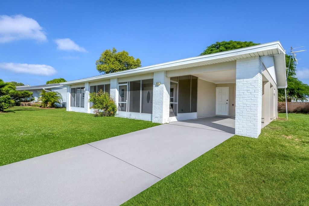 Photo of 13530 Newport Avenue, Port Charlotte, FL 33981 (MLS # A4669163)