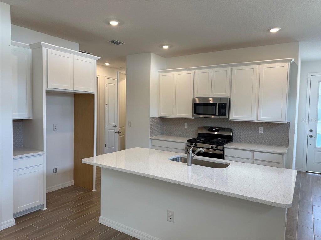 Photo of 3695 Nandina Circle, Sun City Center, FL 33573 (MLS # TB8487266)