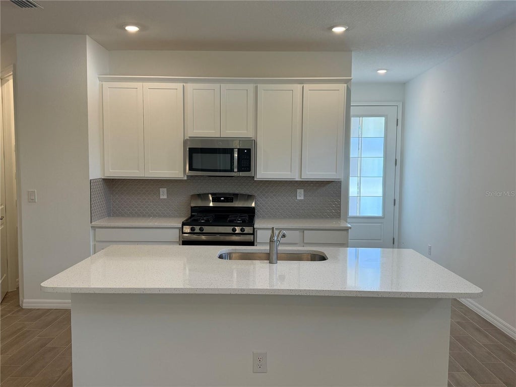 Photo of 3695 Nandina Circle, Sun City Center, FL 33573 (MLS # TB8487266)