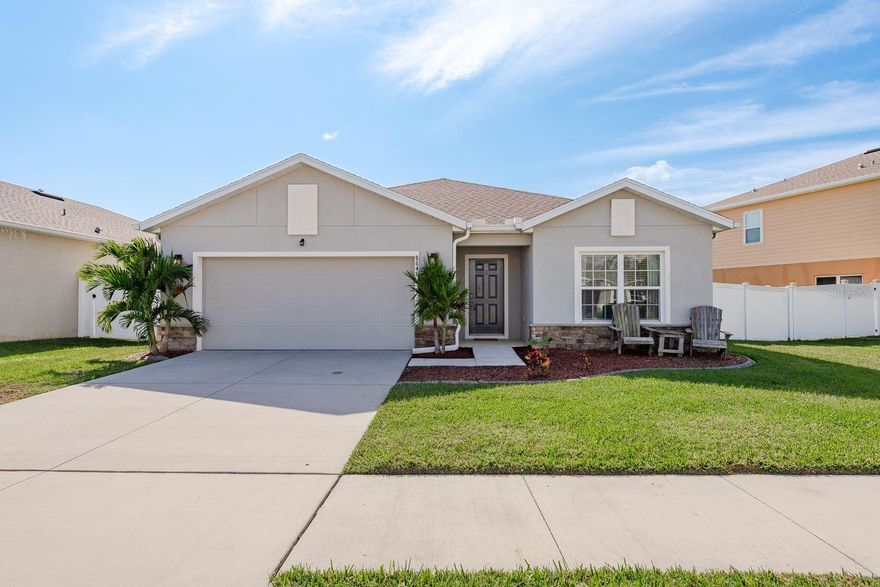Welcome home to this beautifully maintained 2020-built Parkland floor plan, perfectly positioned on a peaceful conservation lot in the warm and inviting community of Mitchell Ranch. With only 91 homes, LOW HOA fees, and no CDD, this neighborhood offers a quiet, friendly feel while keeping you close to all the best of Trinity. Step inside and you’ll immediately appreciate the functional layout. At the front of the home, two comfortable guest bedrooms share a full bath with solid-surface counters and tile extending to the ceiling. Continue through the foyer to the flexible den/open library/Bonus Room, which also works beautifully as a potential 4th bedroom depending on your needs. The heart of the home is the spacious great room, seamlessly connected to the kitchen for effortless entertaining. The kitchen features a large island with breakfast bar, pendant lighting, 42" upper cabinets with crown molding, stainless steel appliances, granite countertops, and large walk-in pantry—everything you need for daily living and hosting alike. Tucked privately at the rear, the owner’s suite offers serene views of the conservation area along with newer luxury vinyl plank flooring. The en-suite bath includes dual sinks, solid-surface counters, a large walk-in shower with floor-to-ceiling tile, a private water closet, and a generous walk-in closet. Additional upgrades include a whole-home water softener, Nest thermostat for energy efficiency, an epoxied 2-car garage with hurricane shutters and WiFi-enabled garage door opener, and a well-sized backyard that backs to untouched natural preserve. HUGE, SCREENED LANAI JUST BUILT is the perfect place to enjoy your morning coffee or unwind after a long day. Just south of SR 54 and Little Road, you’re minutes from top-rated schools, the James P. Gills Family YMCA, JW Mitchell High School, dining, shopping, and everyday conveniences. Move-in ready and thoughtfully updated, this home delivers comfort, style, and an unbeatable location.
