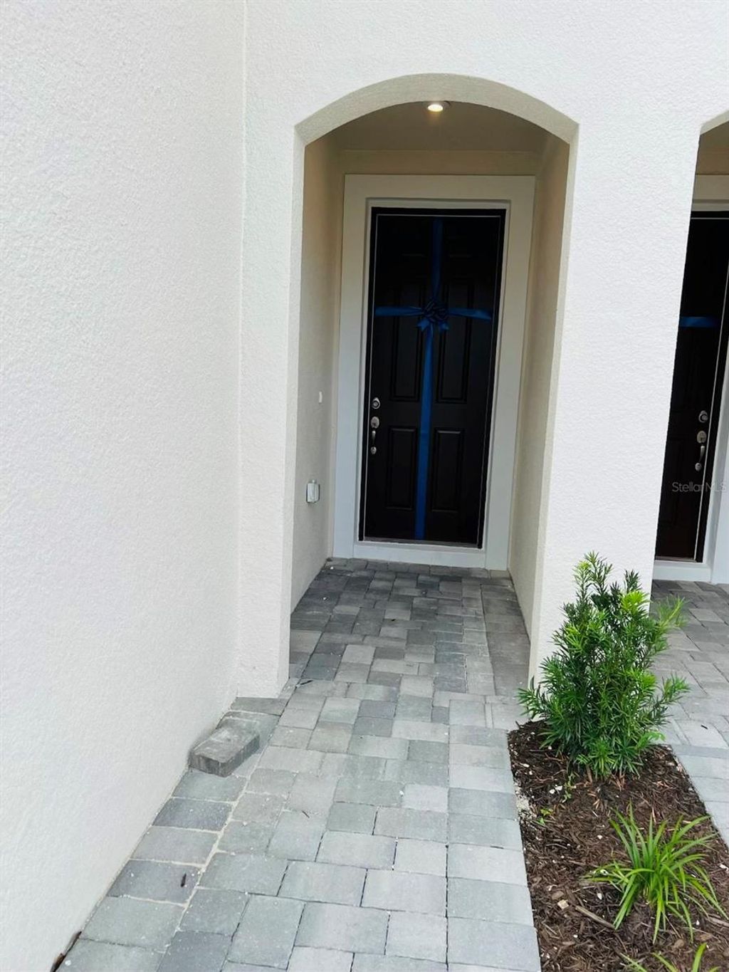 Photo of 19411 Monarch Wind Way, Lutz, FL 33558 (MLS # TB8453597)