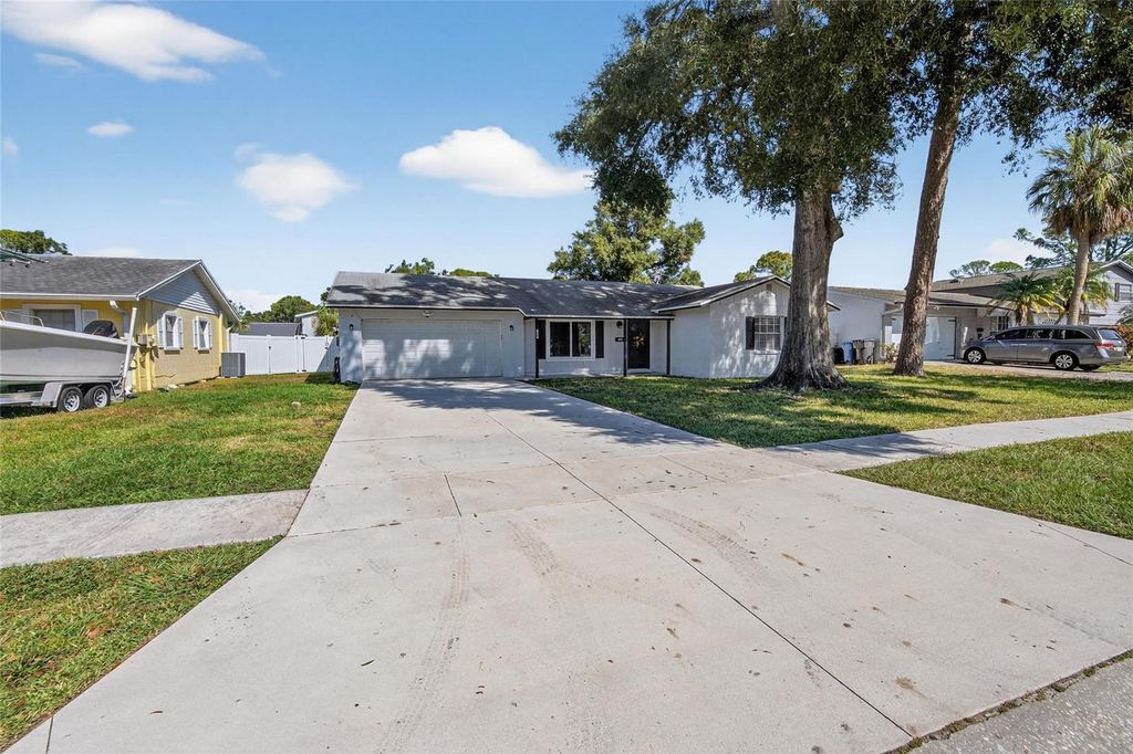 Photo of 7909 West Pocahontas Ave, Tampa, FL 33615 (MLS # TB8443809)