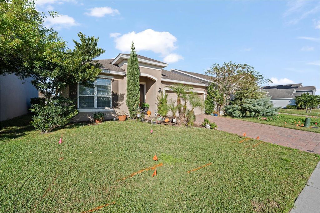 Photo of 1722 Reflection Lane, Saint Cloud, FL 34771 (MLS # TB8441968)