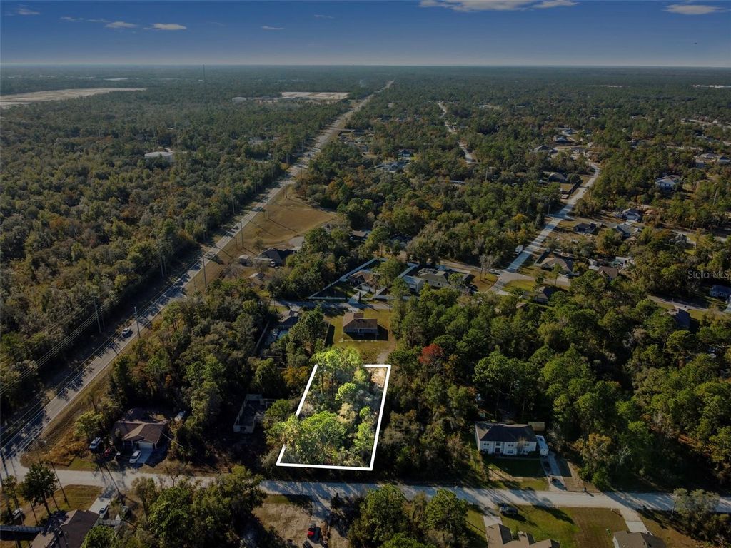 Photo of 11079 Hemlock Warbler Road, Weeki Wachee, FL 34614 (MLS # TB8456424)