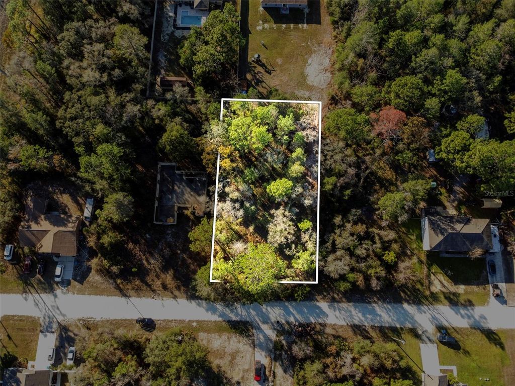 Photo of 11079 Hemlock Warbler Road, Weeki Wachee, FL 34614 (MLS # TB8456424)