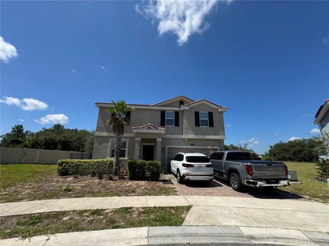 Photo of 1512 Oak Marsh Loop, Davenport, FL 33837 (MLS # O6420497)