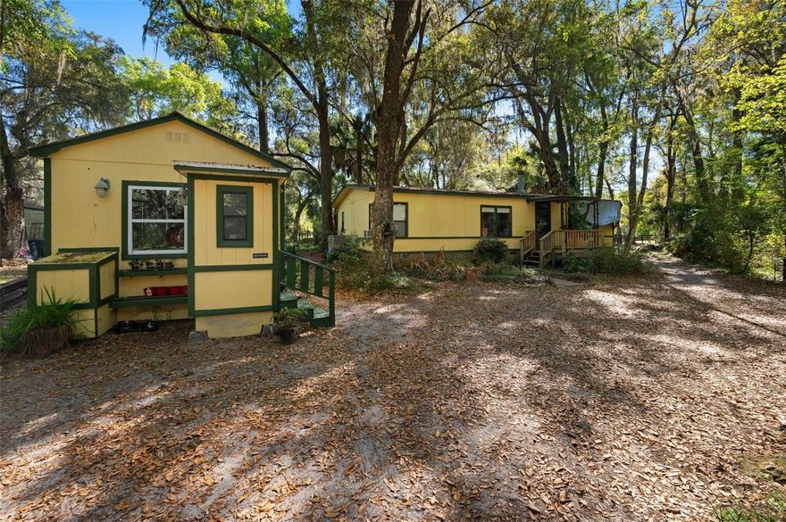 Turnkey Equine Property Between Gainesville & Ocala. Beautifully maintained and fully equipped, this 16.5 acre horse property offers a complete, ready-to-operate equine facility in an ideal location just 10 miles from I-75. Set in a peaceful countryside setting, the property combines privacy with exceptional accessibility. Property highlights include a mobile home plus potential guest house, RV parking pad, arena with clay/sand footing, round pen, two large, grassy pastures with shade trees, three additional paddocks and 6 stall barn with aluminum sliding doors and stall mats, 2 wash racks, 16' x 16' insulated, sheet rocked and air-conditioned feed/tack room, loft storage for equipment, freestanding hay shed, 200-amp electric service with dedicated pole, meter, and panel with room for expansion, plumbed water system ready for its own well. 

The sale includes the long-standing equine business—boarding, leasing, lessons, and trail rides—with excellent reviews and a strong client base. A substantial inventory of tack, equipment, and supplies is included for a seamless transition. Lesson horses may be leased, and current instructors offering immediate income potential. Don't miss out on this outstanding opportunity.