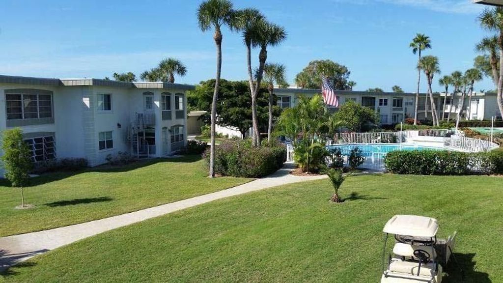 Photo of 6300 Flotilla Drive #108, Holmes Beach, FL 34217 (MLS # A4653416)