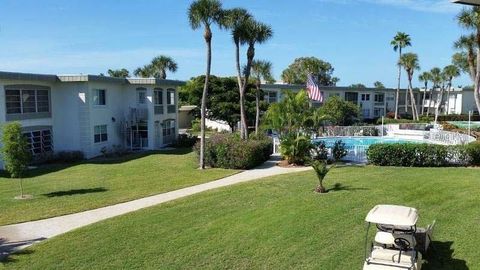 Photo of 6300 Flotilla Drive #108, Holmes Beach, FL 34217 (MLS # A4653416)