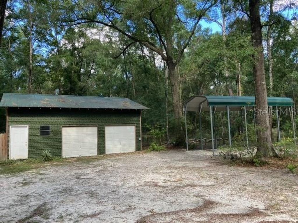 Photo of 267 SE Seawolf Way, High Springs, FL 32643 (MLS # A4669013)
