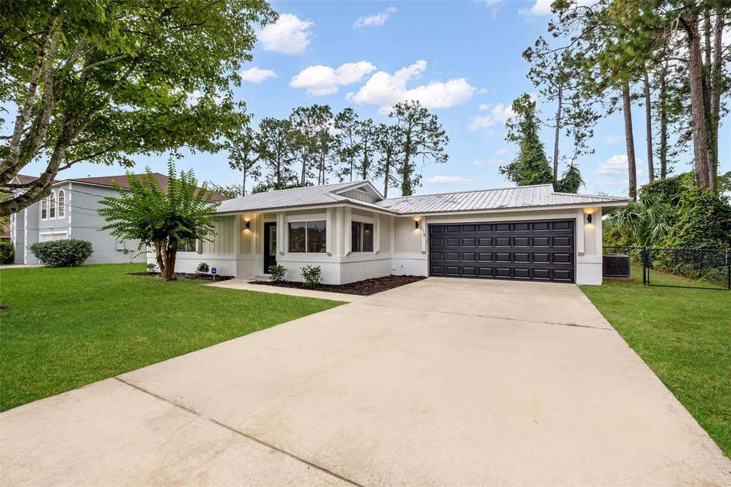 Photo of 114 Beacon Mill Lane, Palm Coast, FL 32137 (MLS # FC320466)
