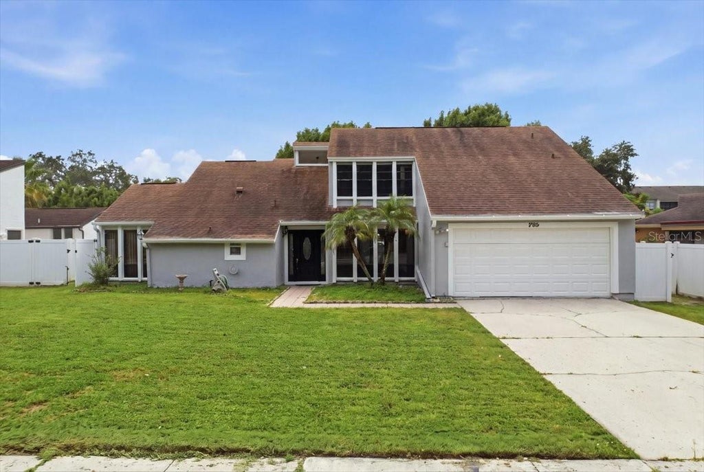 Photo of 2704 Winding Ridge Avenue S, Kissimmee, FL 34741 (MLS # O6447274)