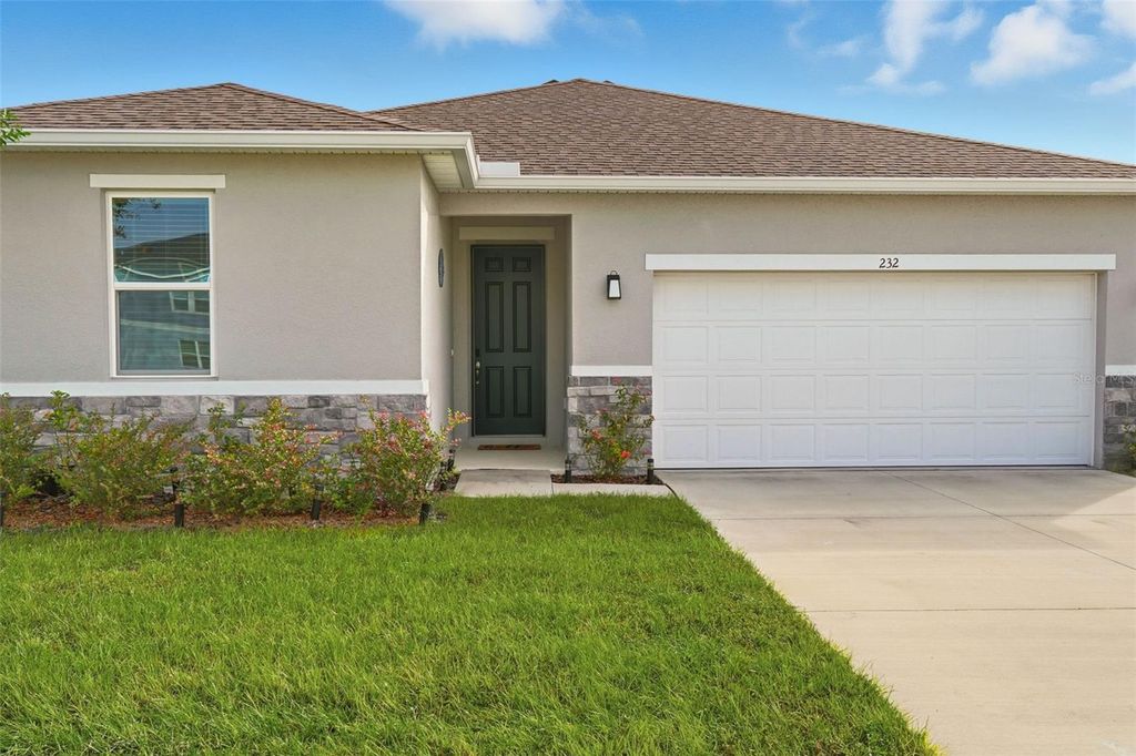 Photo of 232 Spirit Landings Circle, Winter Haven, FL 33880 (MLS # P4936803)