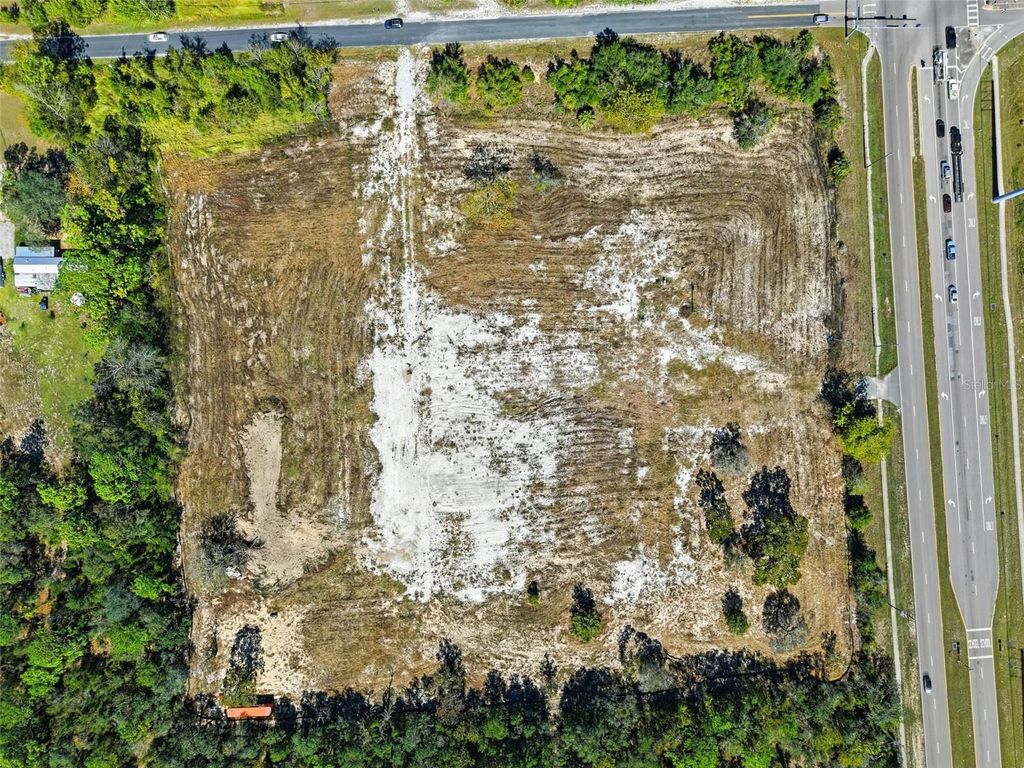 Photo of 9247 Sunshine Grove Road, Brooksville, FL 34613 (MLS # W7886058)