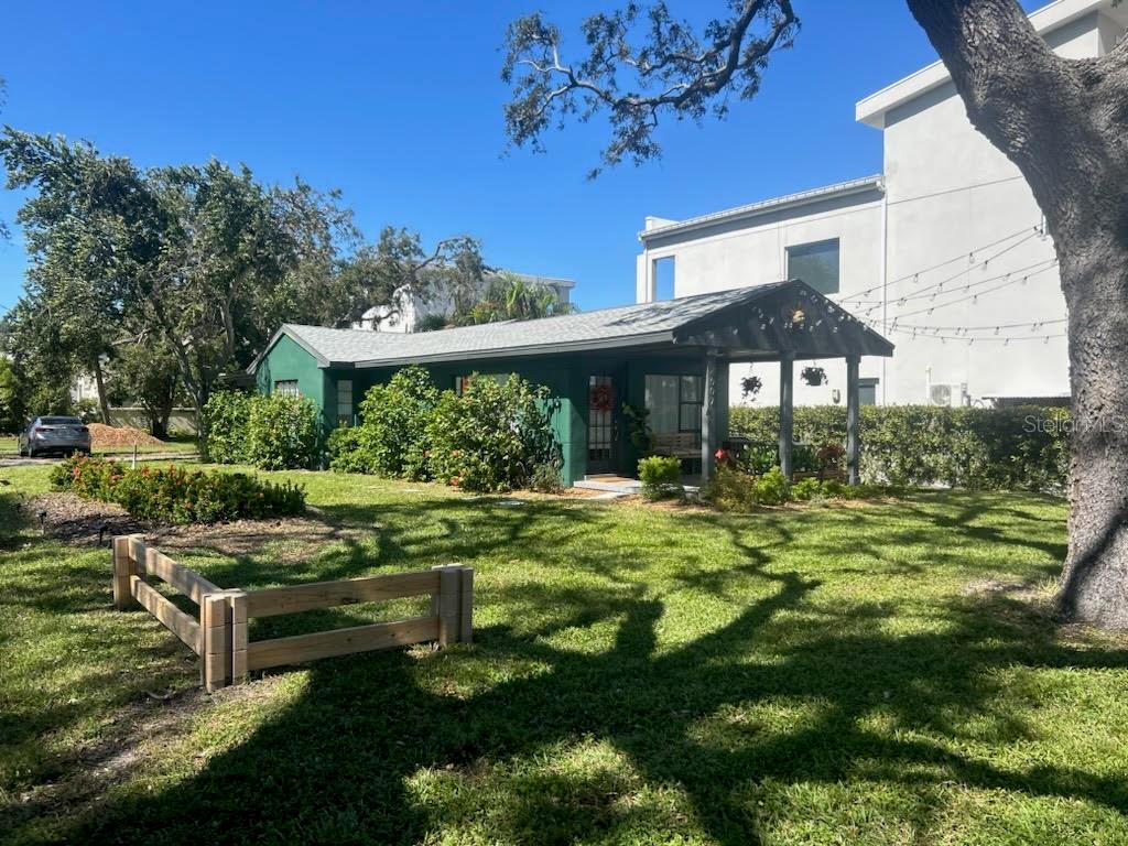 WHO WANTS TO LIVE ON ONE OF THE LONGEST CONTINUOUS PAVED SIDEWALKS IN THE U.S.!?
Located directly on Bayshore Boulevard, the premier urban waterfront in Tampa Bay, this exclusive residence provides a panoramic vantage of the expansive inner Bay, downtown Tampa skyline & Davis Islands to the east, and morning sunrise. Perched above the Boulevard, this 2/1, bungalow home is on an elevated vista above the iconic shoreline balusters in the distance.
Attention to detail, aesthetics and functionality manifested through every turn and viewpoint during this full interior and exterior renovation - new, expanded kitchen, stainless steel appliances, roof, interior & exterior paint, hardwood flooring, bathroom with open shower, separate laundry & utility area, lighting, fans, landscaping, a/c and ample off-street parking; the expanded rear yard offers further opportunity for exercise or entertaining.
This rare, unique, single-family home in South Tampa's renown Bayshore Beautiful neighborhood is ready for a discerning resident who can enjoy a cup of coffee or glass of wine on the front porch or private side courtyard, while overlooking the gorgeous Bay!