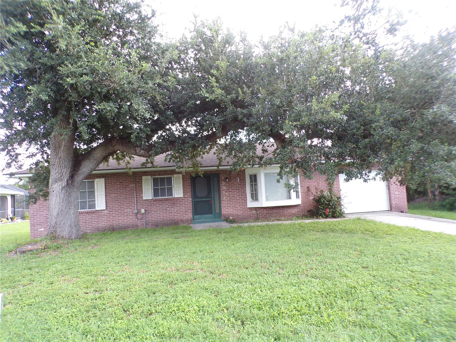 ANNUAL UNFURNISHED RENTAL - Features include separate living room and family room! The family room features a large stone fireplace and a stone floor! It also has an attached garage and a third bedroom! Just a few minutes from the I-75 entrance ramp, you have quick access to Fort Myers and Naples to the south and Venice and Sarasota to the north. It is easy to get to some of the nicest beaches on the coast of the Gulf, including Sanibel Island and Boca Grande. Local Punta Gorda Airport has over 50 non-stop flights around the country and easy accessibility. No HOA, No Deed Restrictions. Come Enjoy this property and make it your Home.