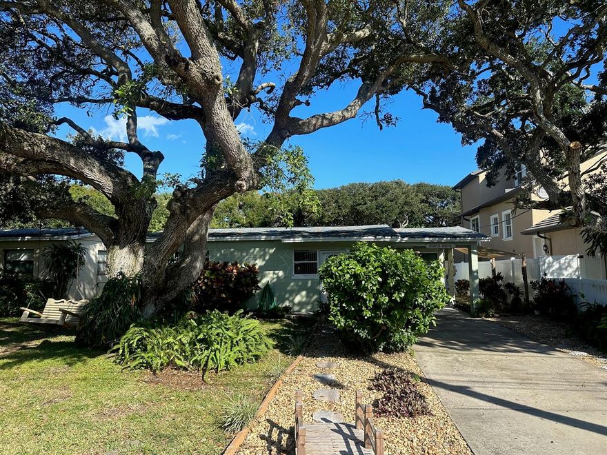 This Beautiful 2 bedroom 1 bath beach house is one block from the beach. In Minutes you can be in the Ocean! Enjoy this beautifully upgraded kitchen with a built in microwave, dishwasher, Refrigerator, and gas range. You have an in home laundry room with a washer and dryer and a separate sitting room. Enjoy mornings and evenings in this spacious private backyard. This home is a classic beach home. Come enjoy everything New Smyrna Beach has to offer! Lawn maintenance included.