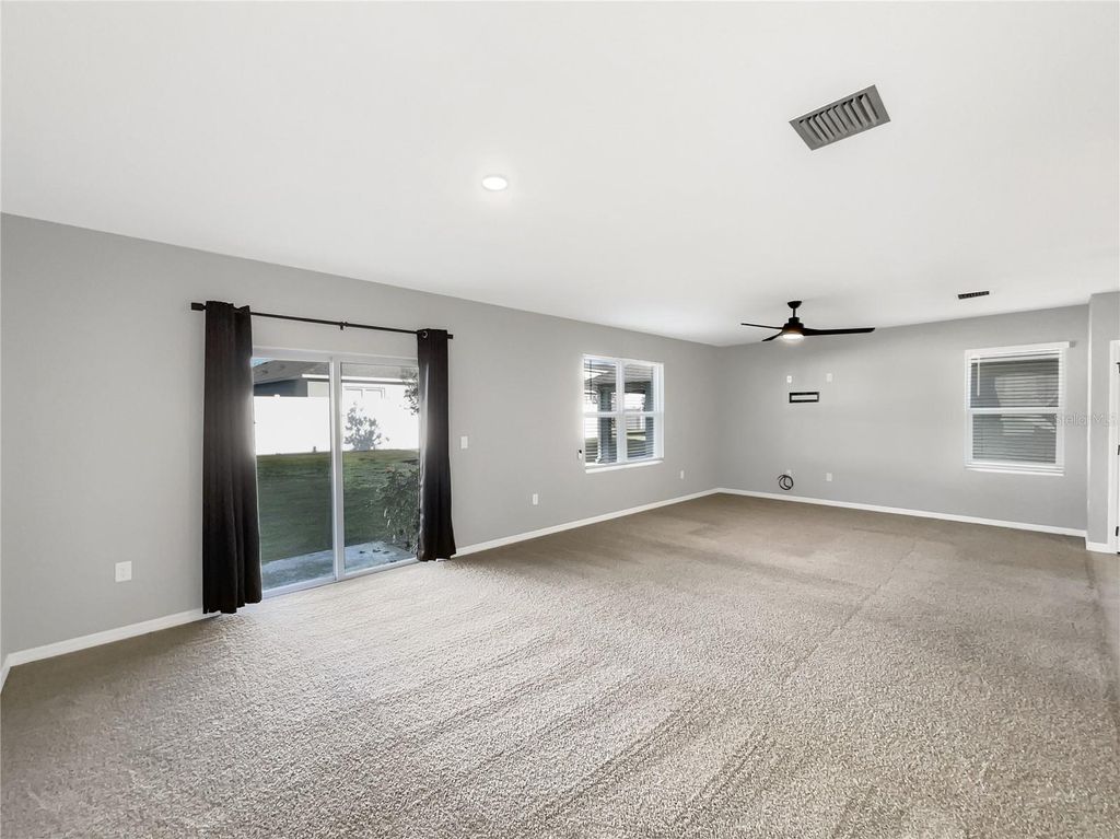 Photo of 3013 Tansy Street, Tavares, FL 32778 (MLS # O6371459)