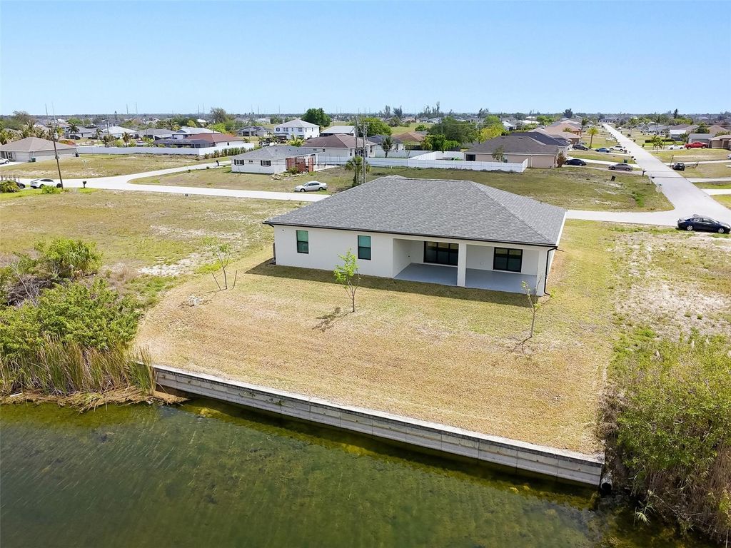 Photo of 2102 NW 6th Place, Cape Coral, FL 33993 (MLS # C7525042)