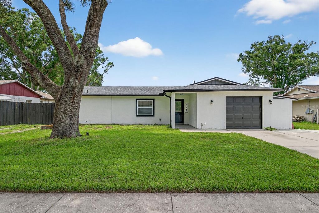 Photo of 17821 Morninghigh Drive, Lutz, FL 33549 (MLS # TB8412364)