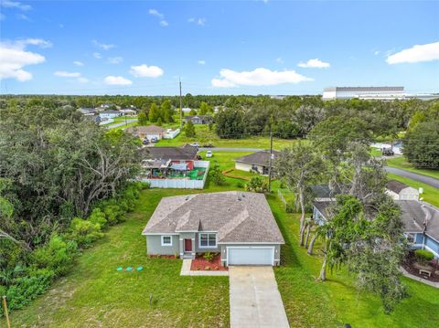 Photo of 306 Marion Oaks Course, Ocala, FL 34473 (MLS # O6349382)