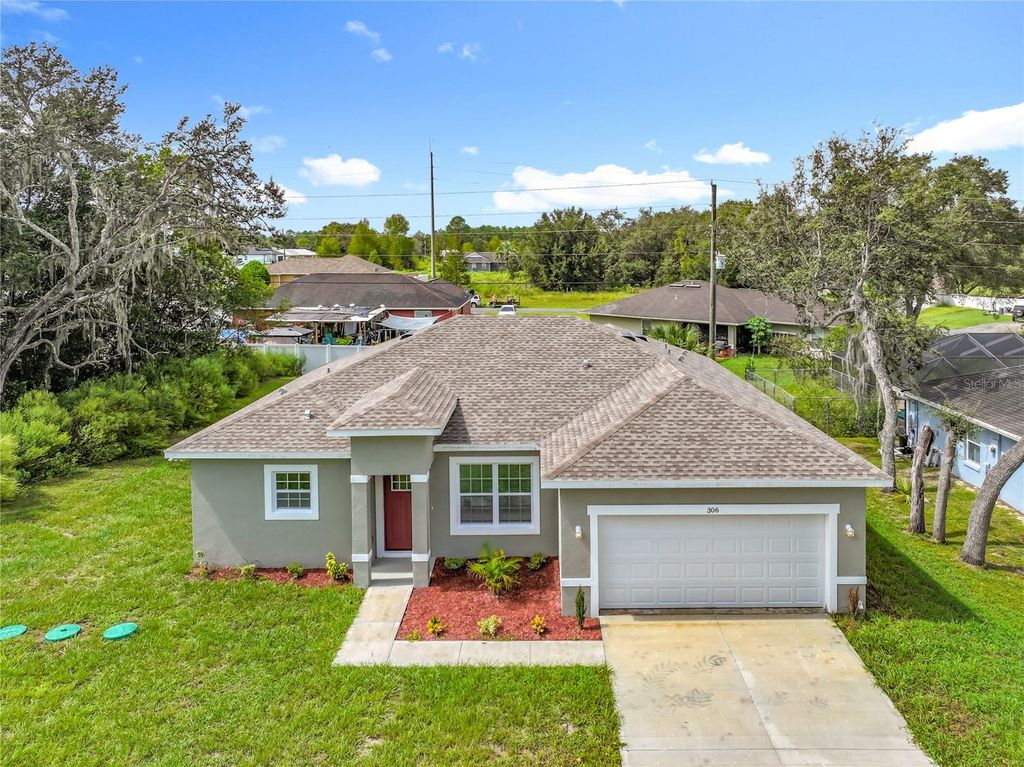 Photo of 306 Marion Oaks Course, Ocala, FL 34473 (MLS # O6349382)