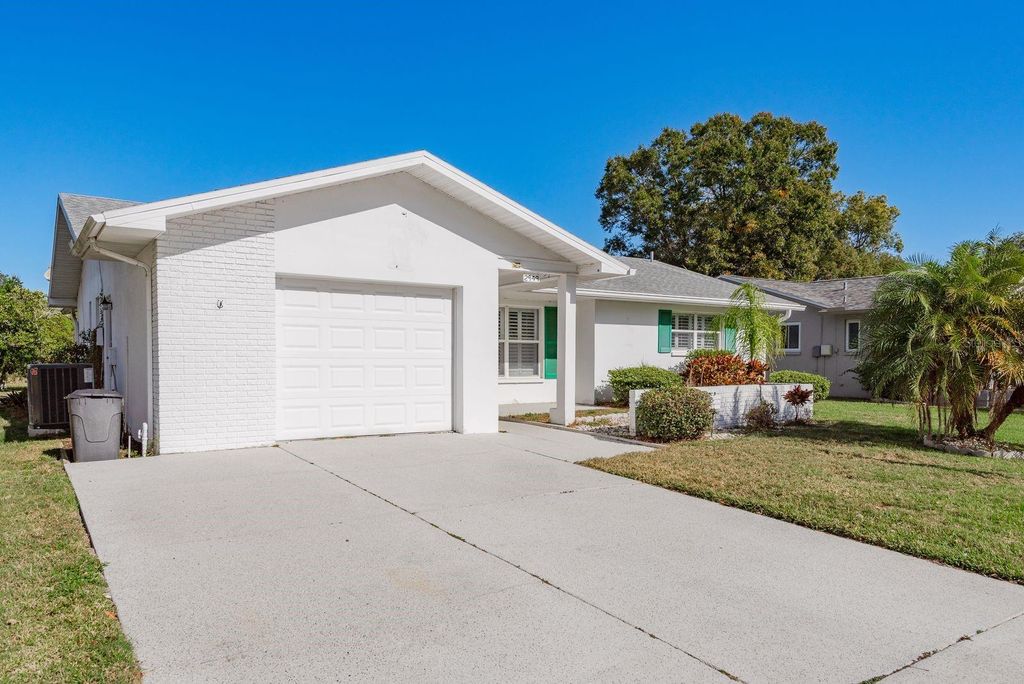 Photo of 2949 Briar Cliff Drive, Palm Harbor, FL 34684 (MLS # TB8455613)