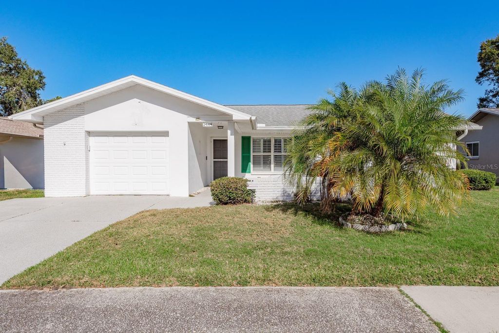 Photo of 2949 Briar Cliff Drive, Palm Harbor, FL 34684 (MLS # TB8455613)