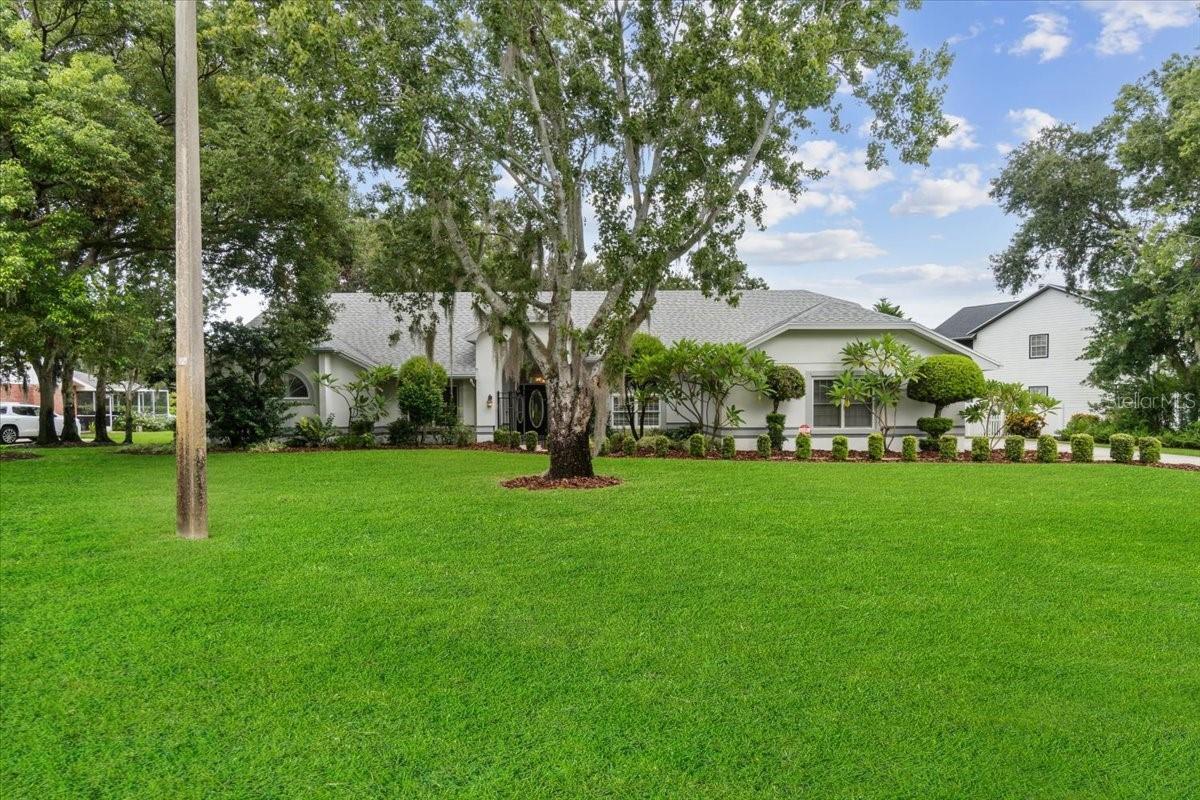 One or more photo(s) has been virtually staged. Located in the sought-after community of Hamilton Pointe, this beautifully maintained 4-bedroom, 2.5-bath, 3,114 SF pool home sits on a half-acre lot with no rear neighbors. The spacious kitchen features an eat-in area and French doors leading to the lanai, while the grand family room boasts 13’ ceilings, crown molding, and a striking coral tile fireplace ******The split floor plan offers a large primary suite with garden tub, walk-in shower, dual vanities, and lanai access, with one bedroom perfect for an office space. Two bedrooms are on the other side of the home with another full bath and laundry room. Outside, enjoy mature landscaping, a refreshing screened-in pool (resurfaced approx. 3 years ago, new sand filter 2 years ago, rescreened 1 year ago), and peaceful privacy ****Recent updates include: new roof (2019), water heater (in garage) (2021), gutters & screens (2020), exterior paint (2019), and whole-home re-piping (2021) HVAC is 2009 ****Conveniently located near downtown Winter Haven, Hwy 27, LEGOLAND, golf courses, shopping, and airports—this home blends comfort, space, and prime location.