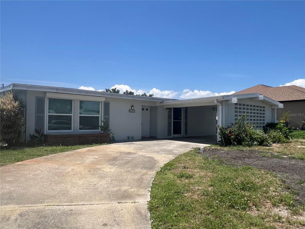 Photo of 167 Easton Drive NW, Port Charlotte, FL 33952 (MLS # C7510238)