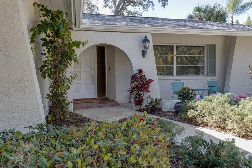 KNOCKOUT LOCATION and exceptional design make this Mid-Century Modern 1756 SF 2BR/2BA pool home on a double corner lot and high elevation in Crystal Beach with a 220 SF enclosed porch/guest bedroom a must-see. Perfect LOCATION--very close to Sunset Beach, Live Oak Park, and Pinellas Trail. Picturesque curb appeal with 2-CAR SIDE GARAGE, circular driveway, curved walkway, and mature native landscaping freshly pruned for spring. NEW gorgeous deep salt water pool with sundeck and luxurious travertine pavers. NEW noseeum-screened lanai, and front porch. ALL NEW AC, Skylight, Flooring, Sunroom, Fans, Kitchen, Appliances, Library, and Lighting. Split floor plan adds convenience and privacy. Family room with fireplace. Hurricane protected windows. Home has all the amenities for the Florida lifestyle including a parking pad in fenced backyard and a NEW RV hookup. Stroll to Sunset Beach and Live Oak Park for nightly gatherings, or to the quaint Crystal Beach Post Office and Pinellas Trail. Zoned for the county’s best schools.This is your chance to own a double lot on a high elevation close to the gulf. Build up for unobstructed water views, or enjoy life without stairs forever! No HOA. No flood insurance required.