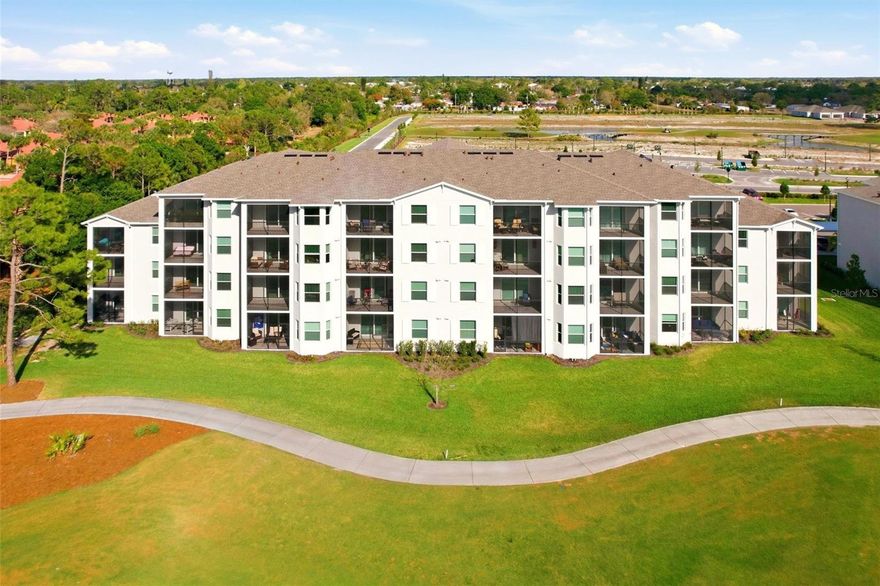 Welcome to luxury living in Lehigh Acres. Golf Membership Included! This beautifully appointed Birkdale 2-bedroom, 2-bathroom condominium is located within the gated community of Ibis Landing Golf and Country Club. Perched on the 4th floor, the residence offers breathtaking golf course and lake views, creating a peaceful and picturesque setting. The unit includes covered parking (#422) and a private storage room (#422) for added convenience. Inside, the home features an inviting open floor plan with high ceilings, crown molding, and tile flooring throughout the main living areas. Hurricane-impact sliding glass doors and windows provide added safety, energy efficiency, and peace of mind. The single-level design seamlessly connects the kitchen, dining area, and living room, with sliding glass doors leading to the lanai—perfect for enjoying indoor-outdoor Florida living. The well-appointed kitchen showcases raised-panel wood cabinetry with upper crown molding, Quartz countertops, stainless steel appliances, pantry closets, and a breakfast bar accented by stylish pendant lighting. The kitchen flows effortlessly into the spacious dining and living areas, making it ideal for entertaining. The bright and airy primary suite features plush carpeting, a walk-in closet, and a private ensuite bathroom with a Quartz vanity and a walk-in tiled shower. The guest bedroom offers generous closet space and is conveniently located near a separate full guest bath—perfect for visiting family or friends. A dedicated laundry area is located just off the foyer and includes a washer and dryer for added functionality. Step out onto the lanai where the desirable eastern exposure provides beautiful morning sun and cool afternoon shade, along with stunning water views that enhance the tranquil atmosphere. Ideally situated with easy access to major roadways, the condo offers convenient proximity to RSW International Airport, shopping, dining, and everyday essentials. Residents will enjoy membership to the Ibis Golf and Country Club, featuring a Gordon B. Lewis championship golf course designed to accommodate players of all skill levels. Additional community amenities include a resort-style pool, fitness center, clubhouse, sports courts, pickleball and tennis courts, and scenic walking trails. An on-site restaurant is also planned and currently under construction. This condo offers more than just a home—it offers a lifestyle. Experience the best of Florida living at Ibis Landing Golf and Country Club.
**PLEASE ENJOY THE 3D INTERACTIVE VIRTUAL TOUR ASSOCIATED WITH THIS LISTING**